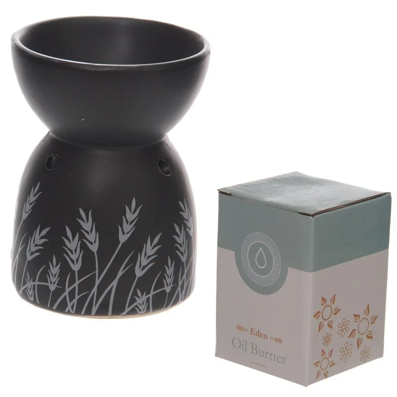 Black and white ceramic wax burner with grass design on porcelain, no candle, designed for oils and wax.