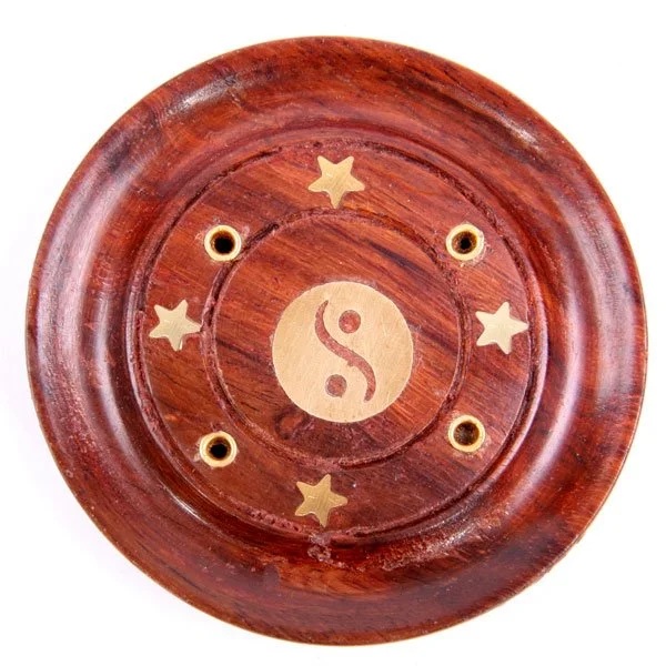 Sheesham wood ash catcher with round yin yang design, metal base, incense stick placement.