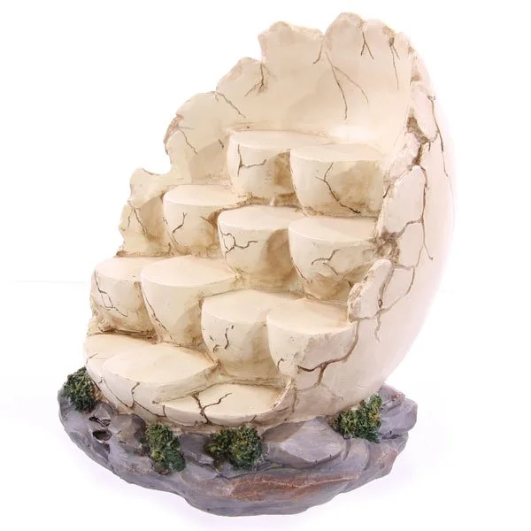 Egg shaped display stand made of resin, tiered design, display only, no figures, made in China.