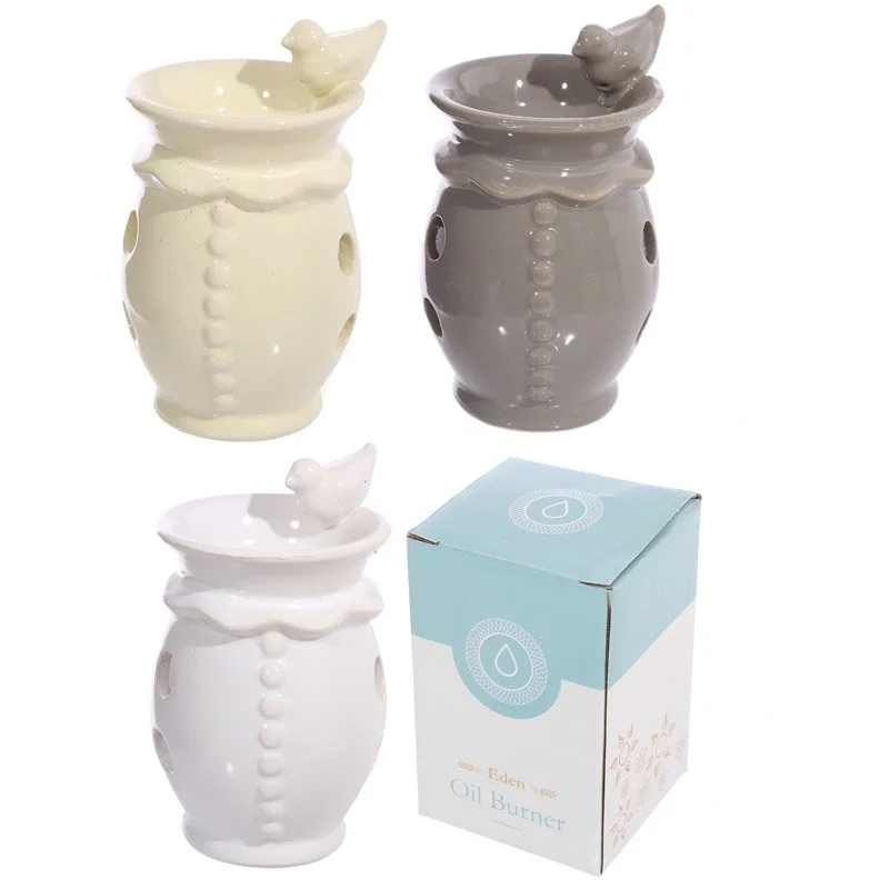 Ceramic oil burner styled like a bird bath, porcelain dish with flat rim and small base