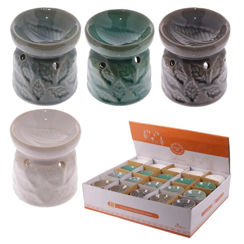 Mini leaf‑shaped dolomite ceramic oil burner, polished surface, positioned on flat background.