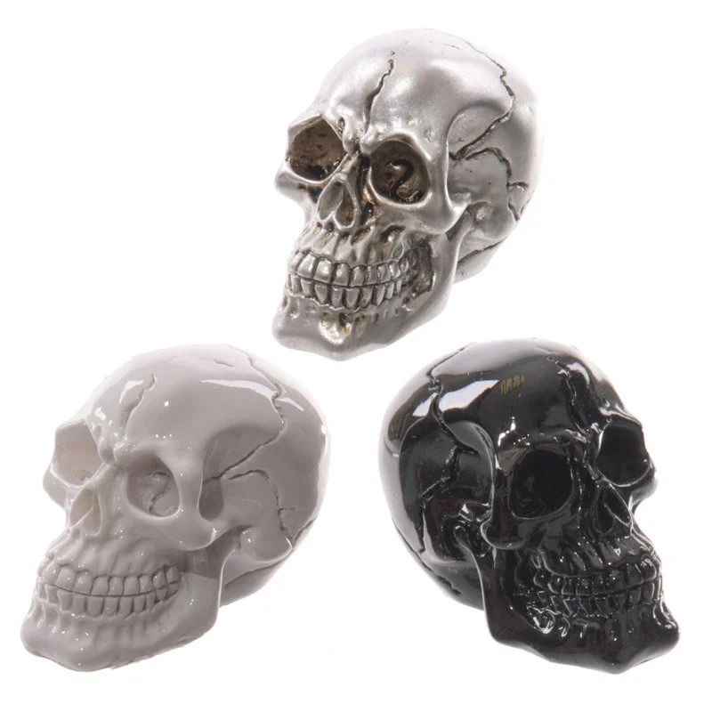 Glossy resin small skull ornament, perfect for Halloween décor, crafted in China.