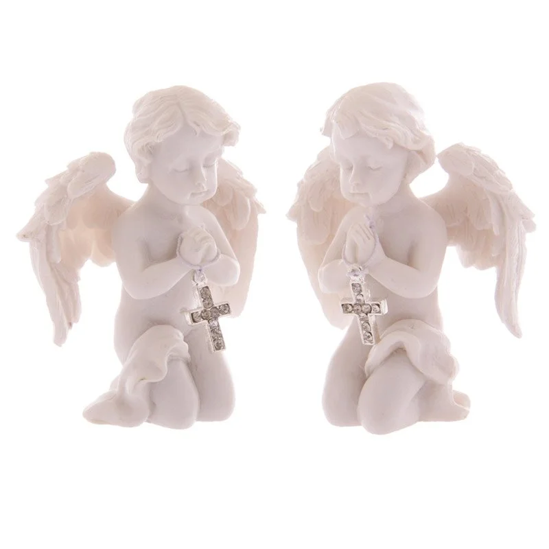Cute praying cherub figurine made of resin, holding a jewelled silver cross.