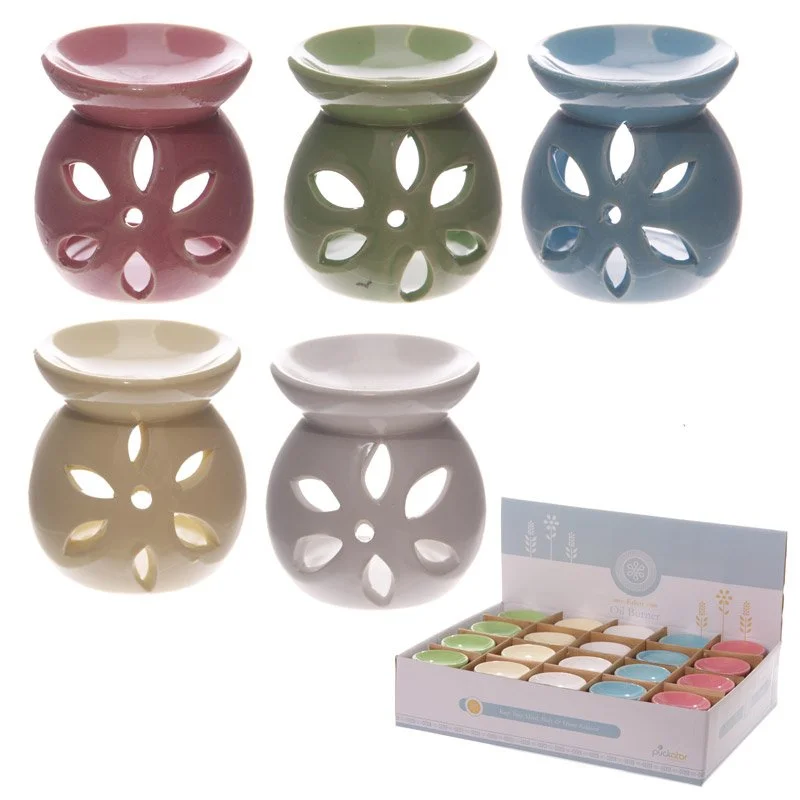 Ceramic oil burner made of dolomite ceramic with simple coloured cut‑out design.