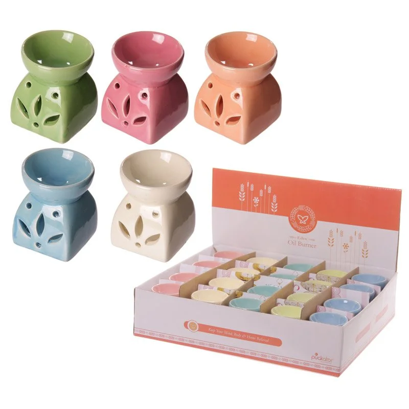 Short squat Dolomite ceramic oil burner in plain colour, ready to hold a tea light.