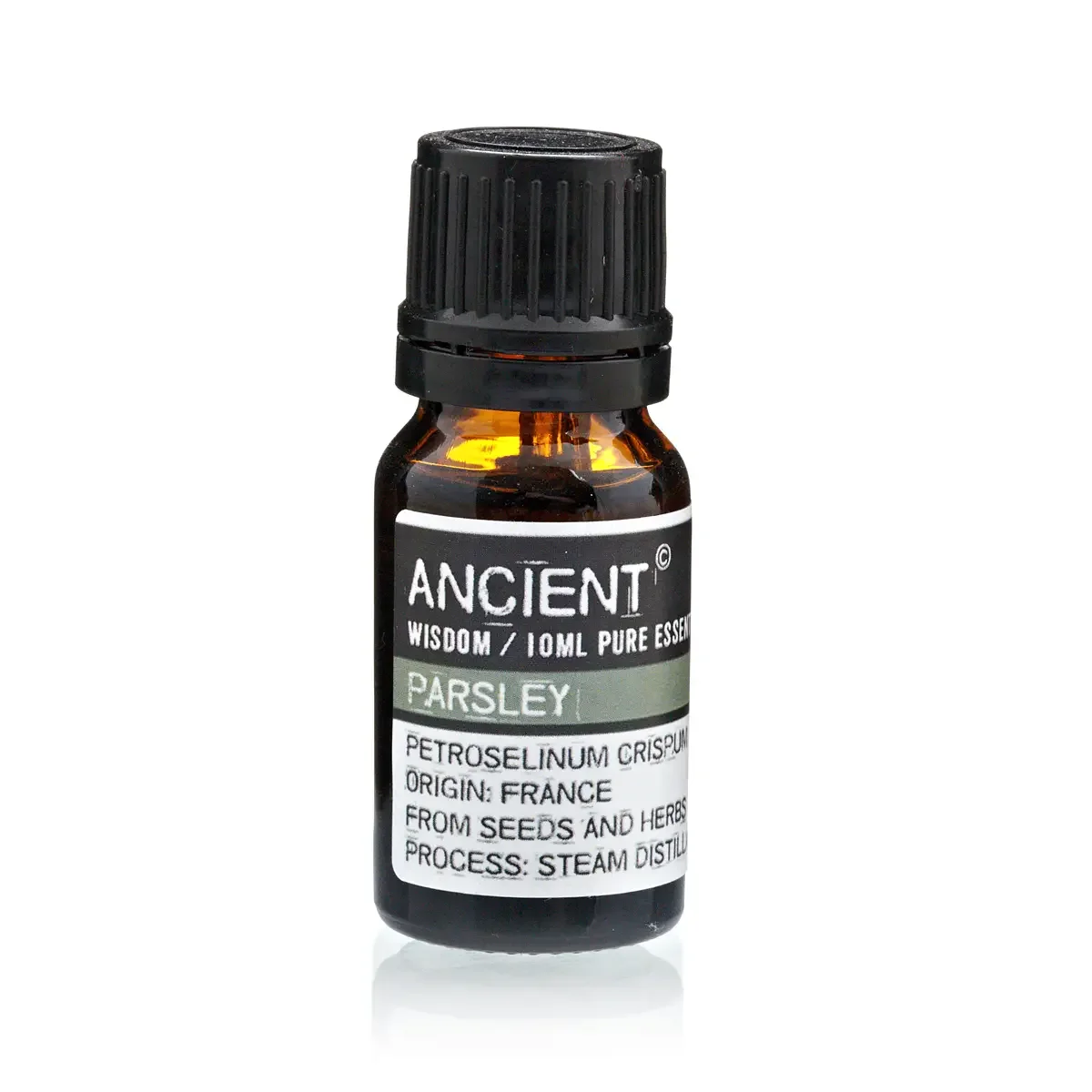 Bottle of 10 ml parsley essential oil in clear glass “Parsel” label, standing against a soft background.
