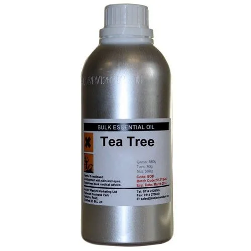 Clear glass bottle of tea tree oil 0.5kg displayed upright on neutral background