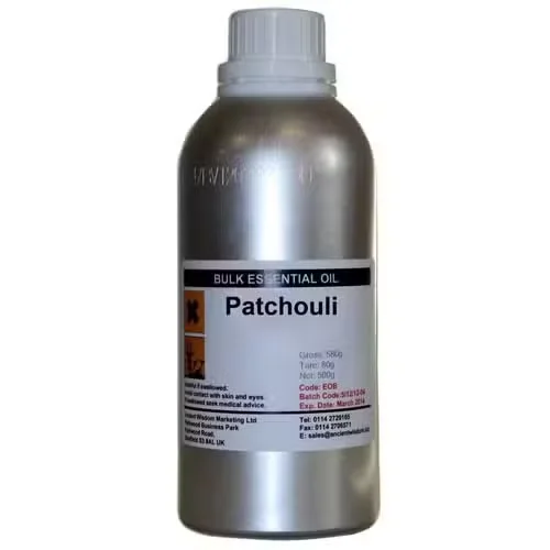 Clear glass bottle labeled Patchouli 0.5Kg, containing aromatherapy patchouli oil.