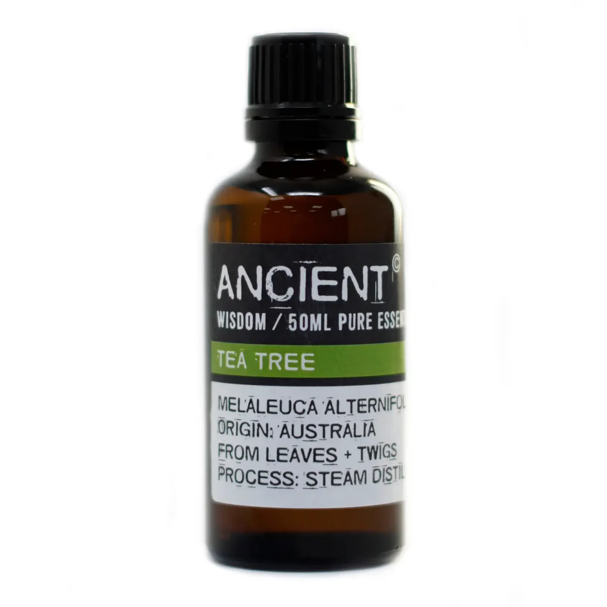 Clear glass bottle of tea tree oil, 50ml, labeled in black lettering.