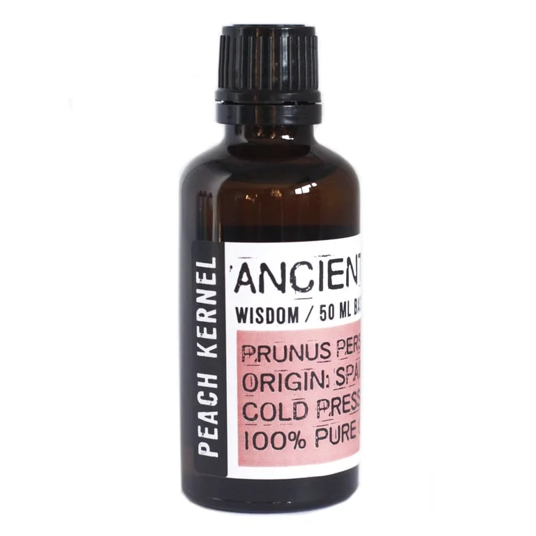 Clear glass bottle of peach kernel oil, 50ml.