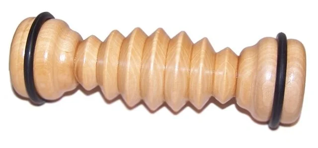 Ribbed foot roller with textured ribbing and compact handheld design
