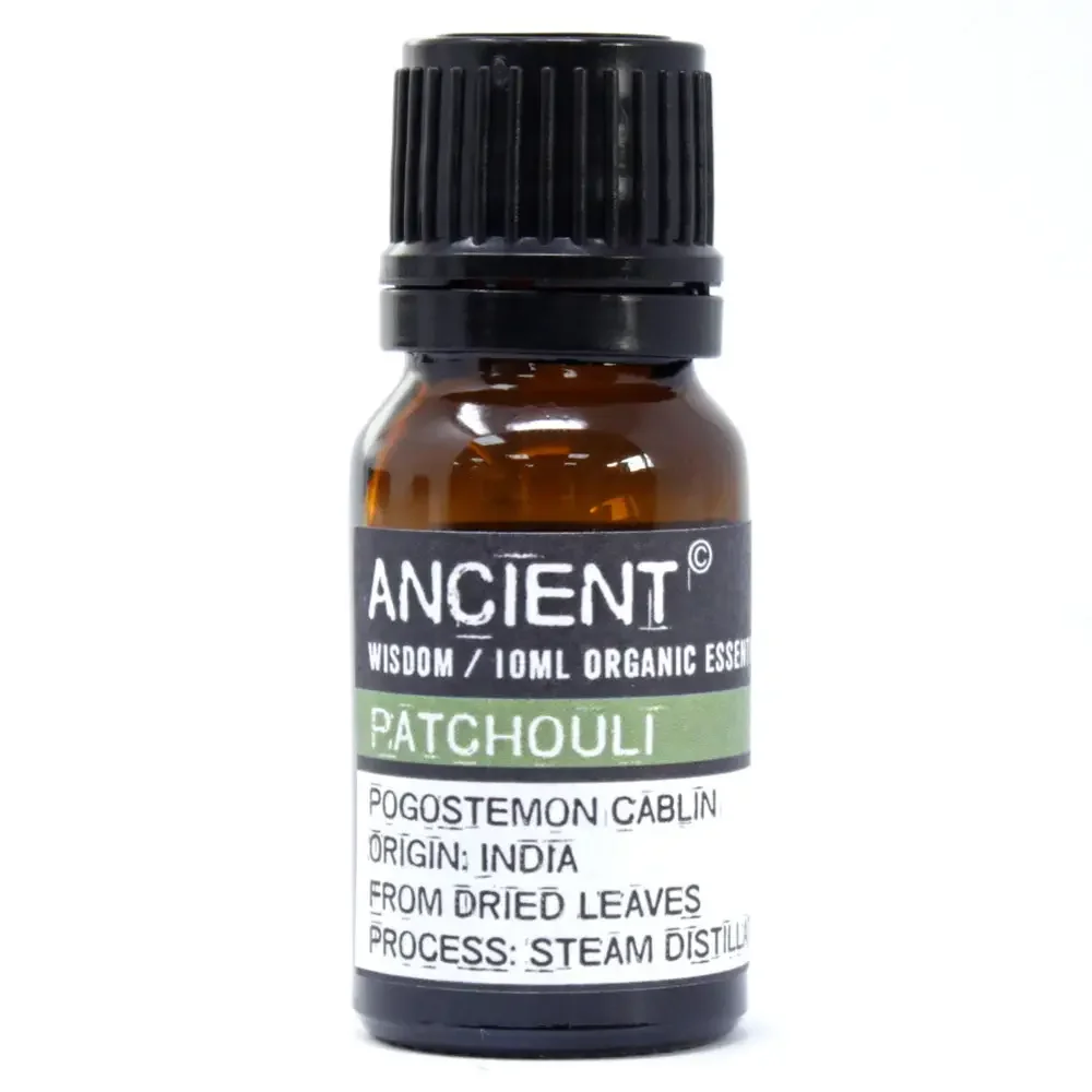 Dark amber liquid in a 10ml glass bottle of organic patchouli oil branded for essential use.