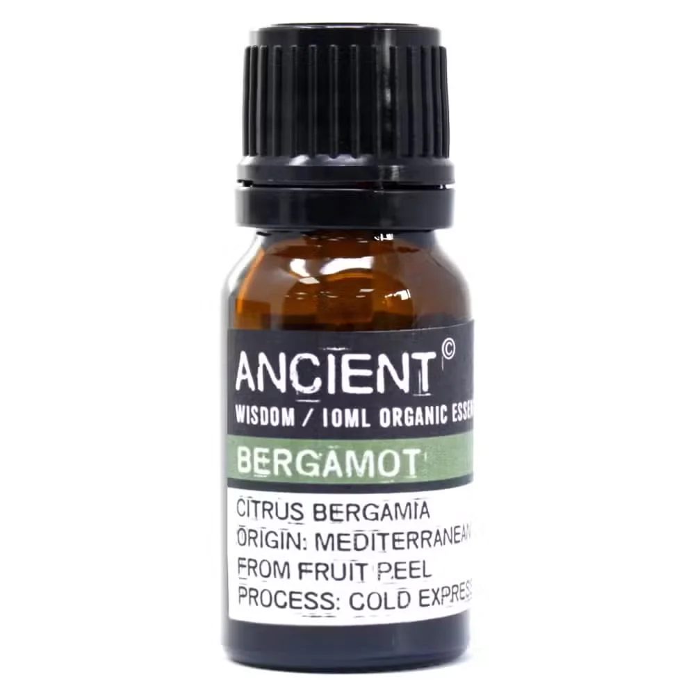 10 ml amber glass bottle of essential oil bergamot, labeled ‘Bergamot Organic Essential Oil’