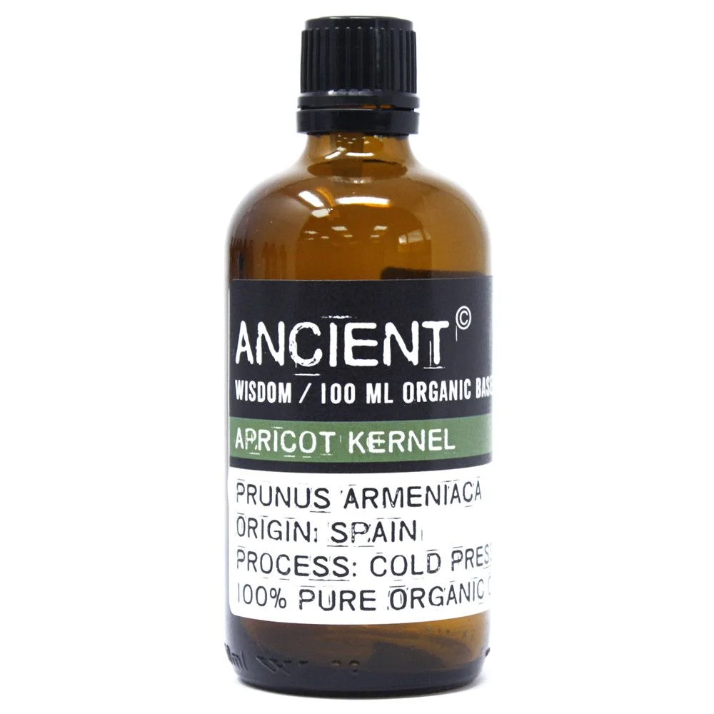 Glass bottle containing 100ml organic apricot kernel oil, labeled simply.