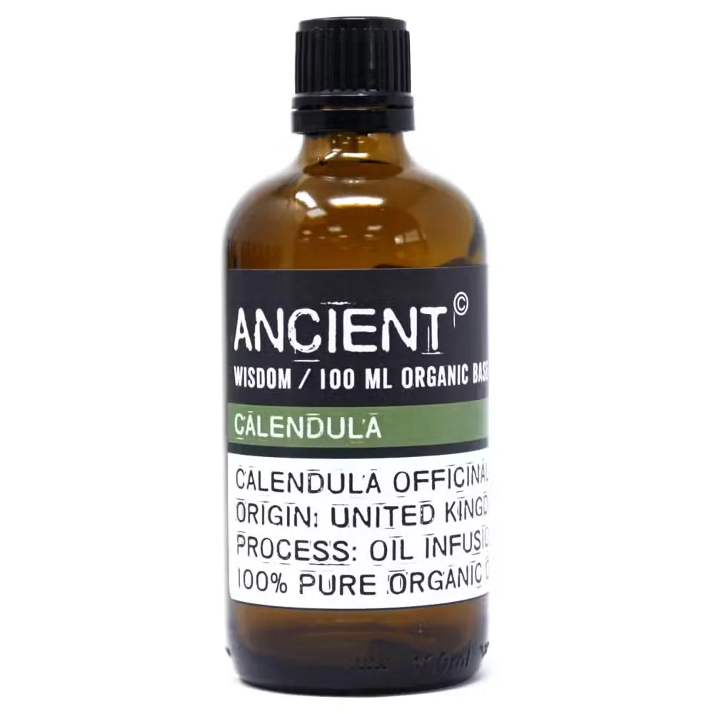 Calendula base oil 100ml bottle with printed label.