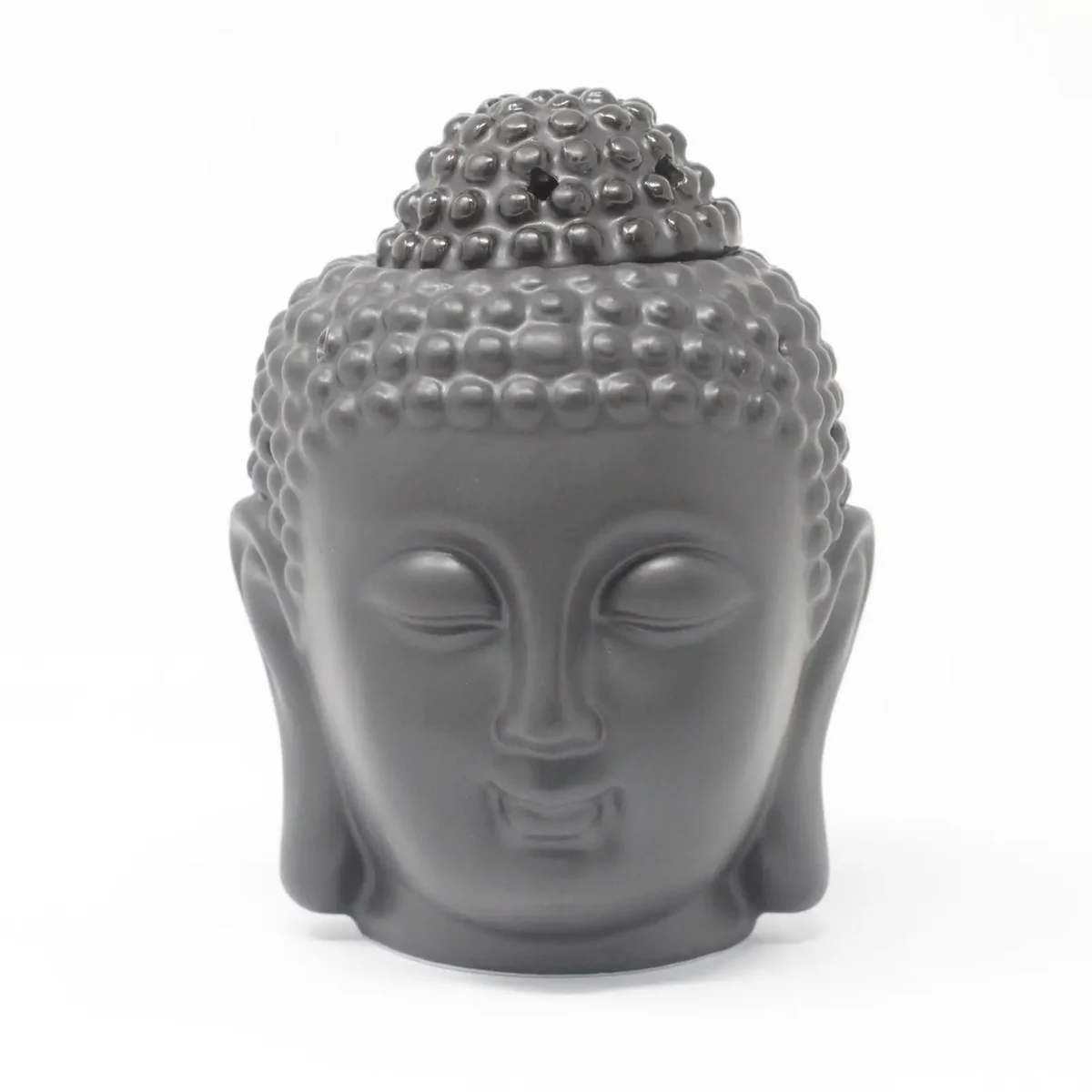 Dark brown Buddha head oil burner with intricate ceramic design.