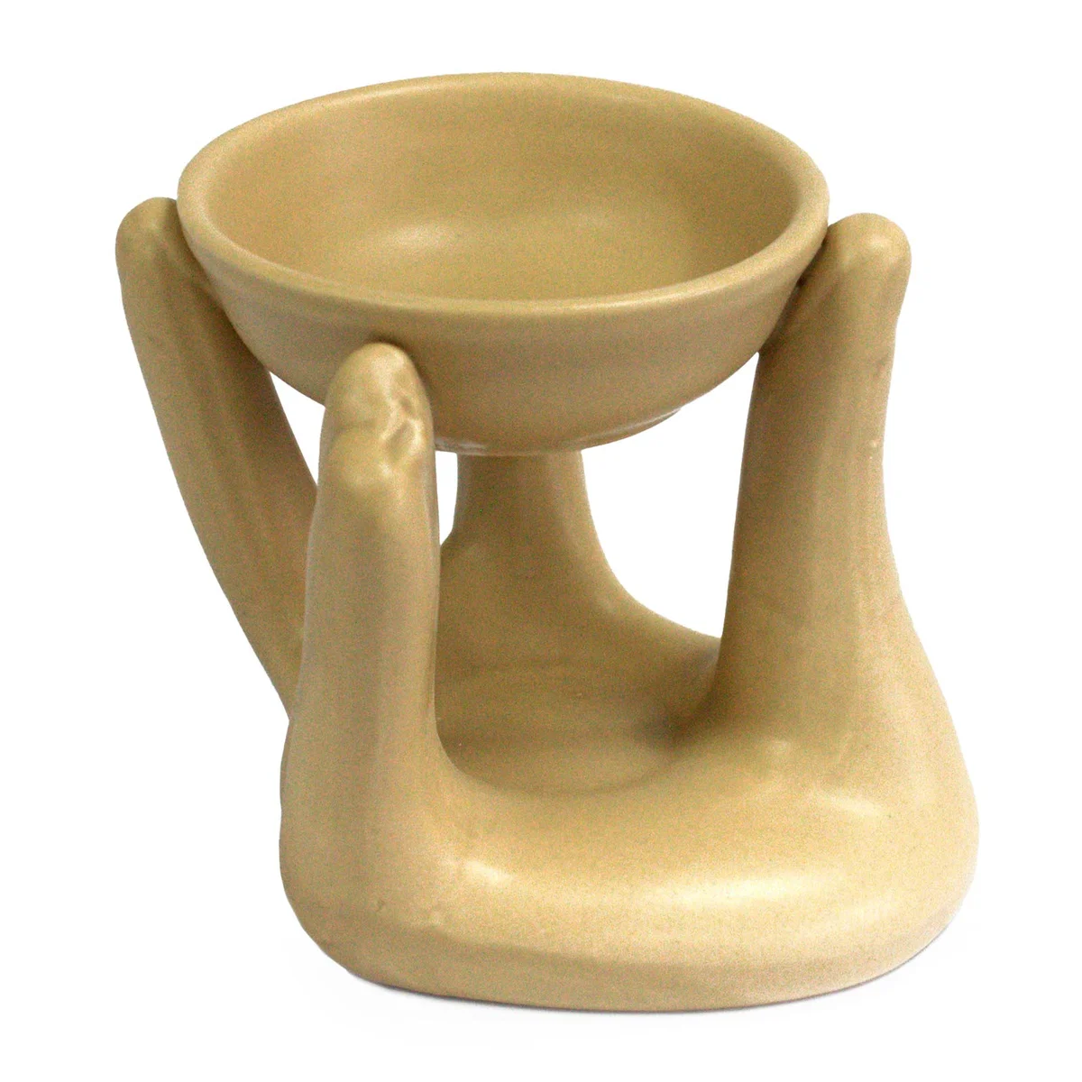 Tan aromatherapy oil burner from Open Hands model.
