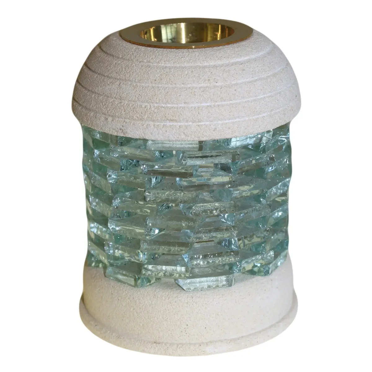 Round stone oil burner made from glass brick, offering a sleek, minimalist design.