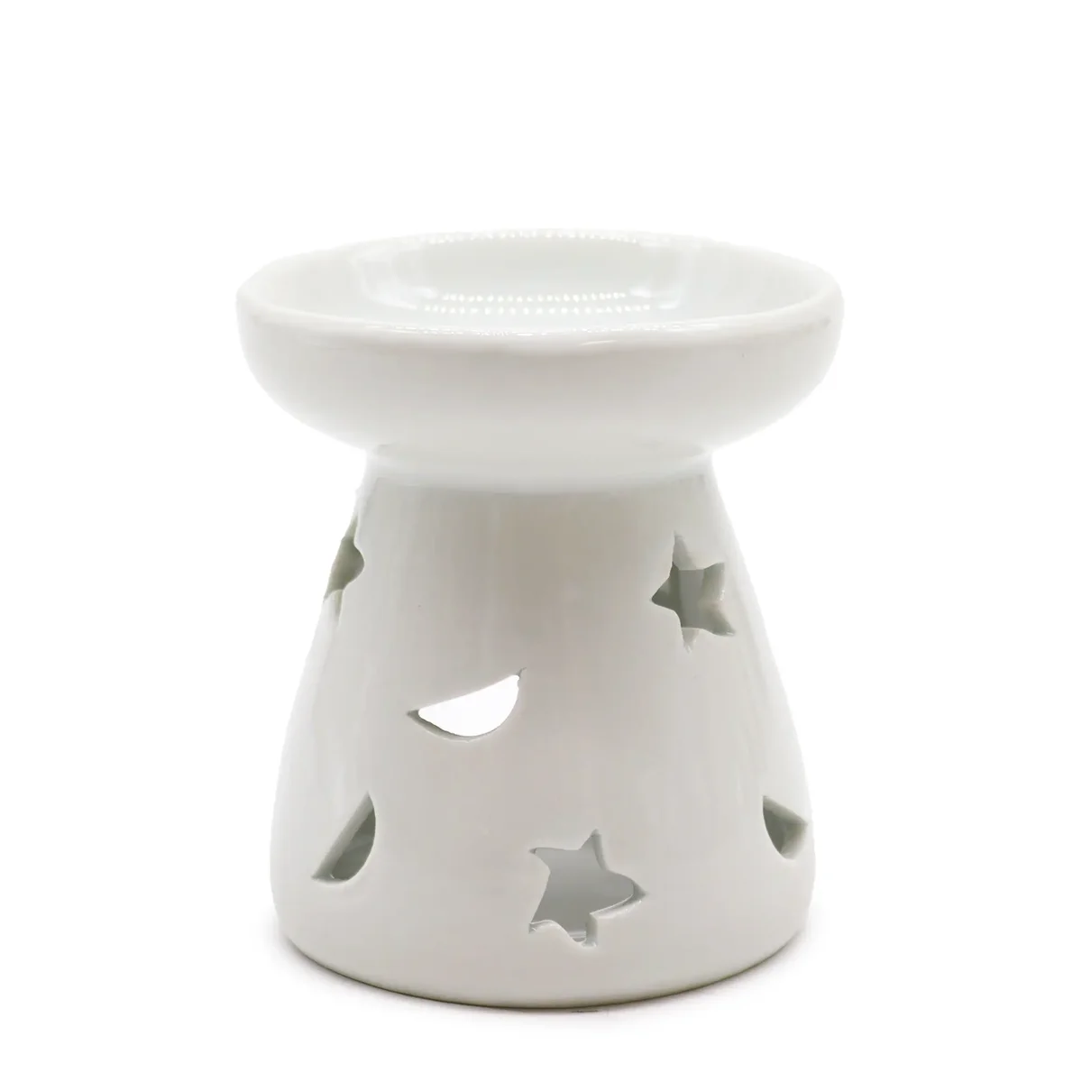 Sm classic oil burner in white with moon and star design on the body.