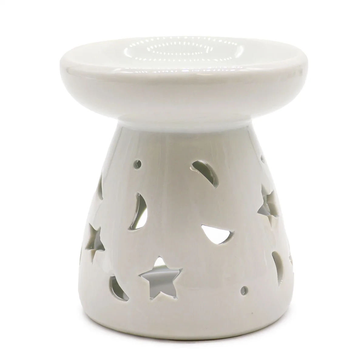 Large white oil burner with moon and star design.