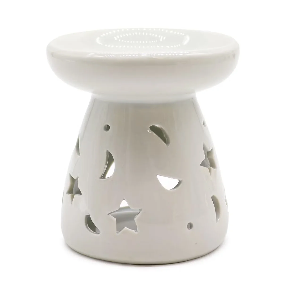 Large classic white oil burner featuring moon and star motif, ideal oil burner decor.
