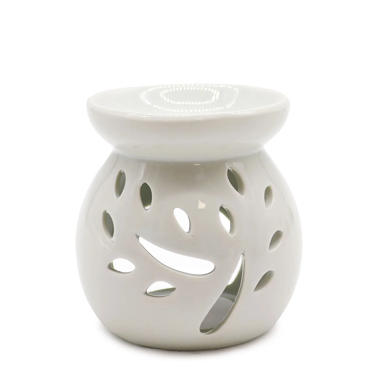 White oil burner with tree cut‑out design, classic style.