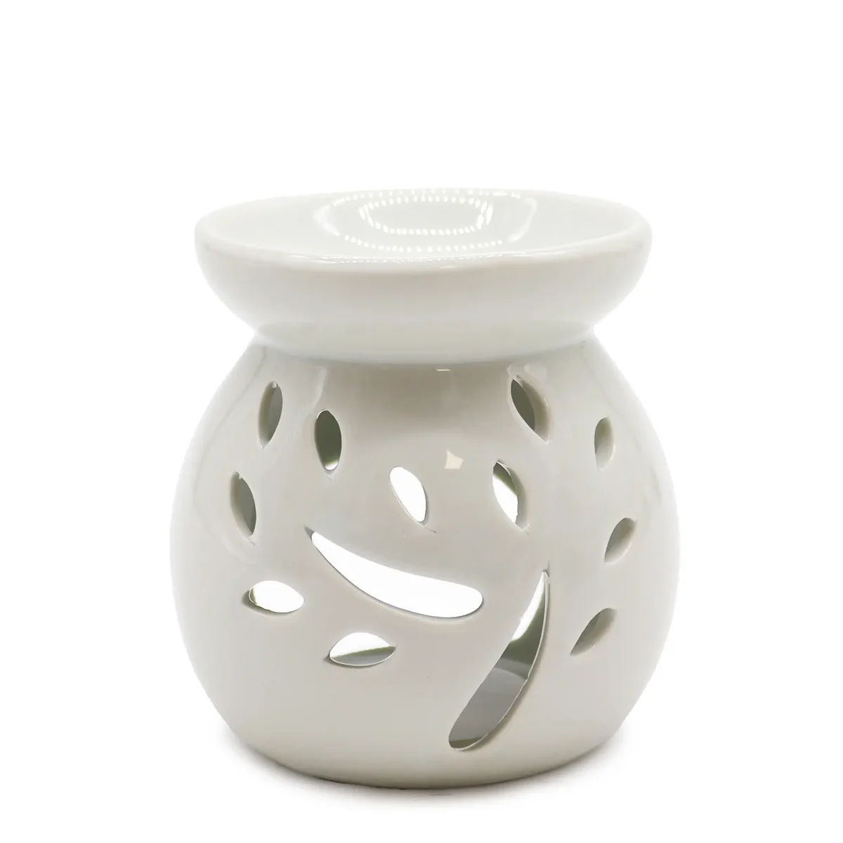 Classic oil burner with tree cut‑out, white finish.