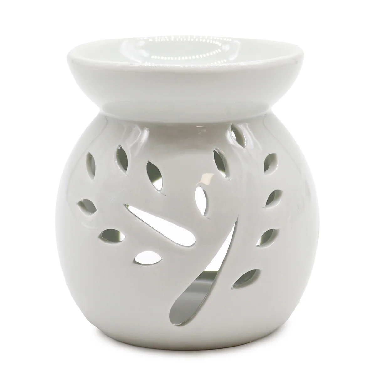 Large classic white oil burner featuring a tree cut-out design