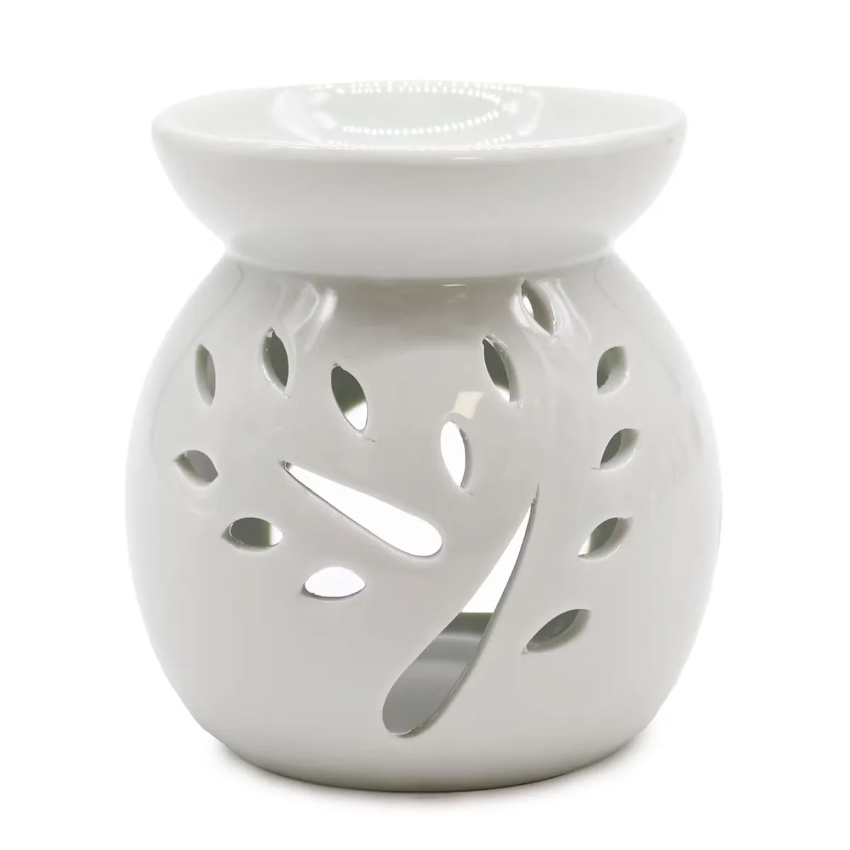 Large oil burner with a tree cut‑out design, finished in white.