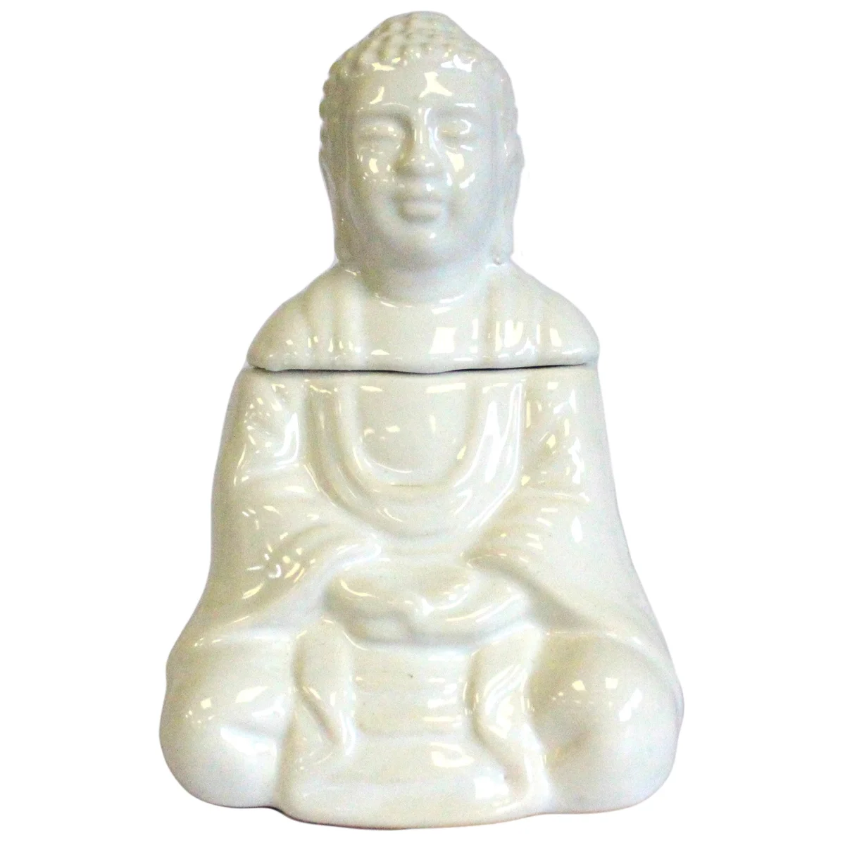 White sitting Buddha oil burner on a flat surface.