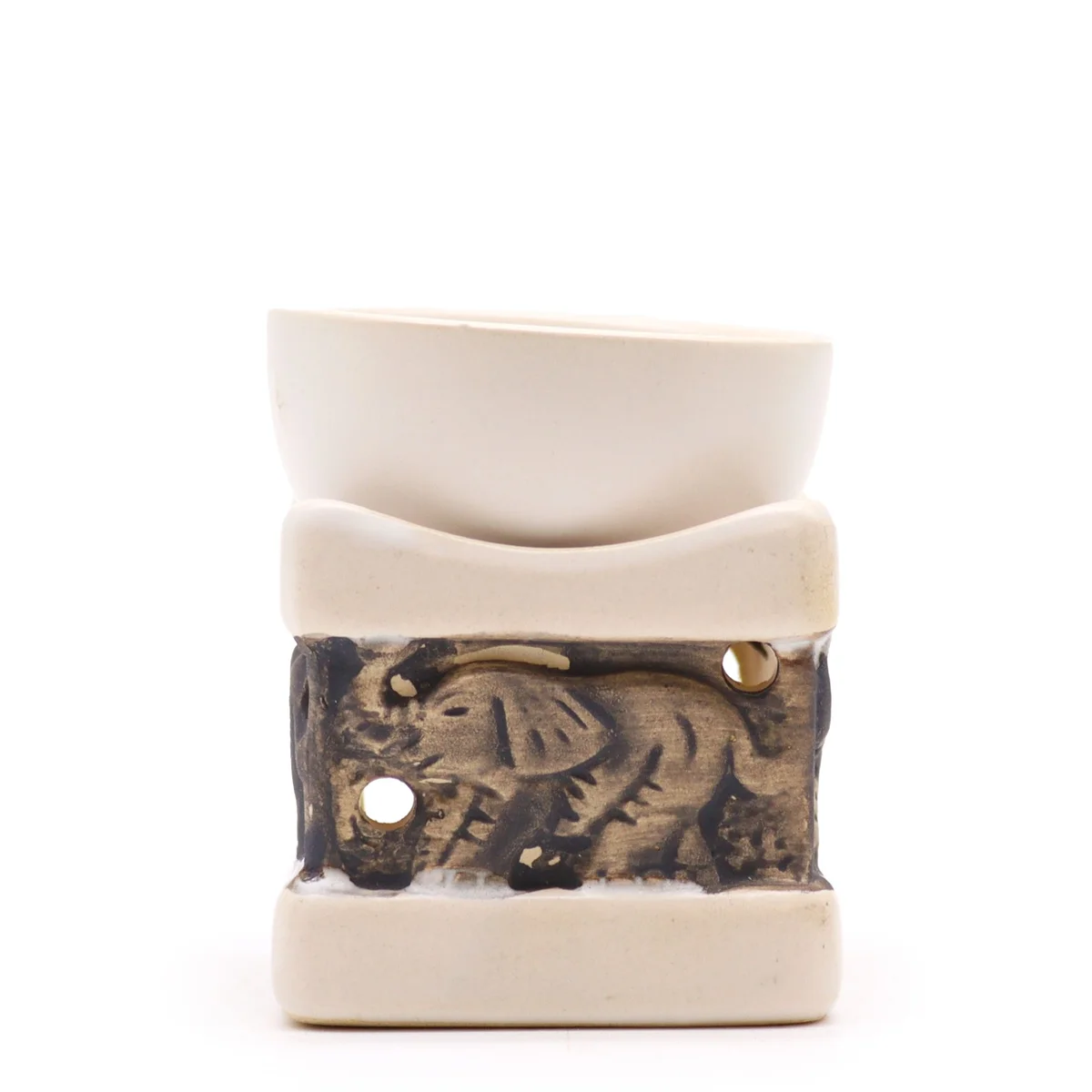 Classic elephant oil burner with detailed elephant design.