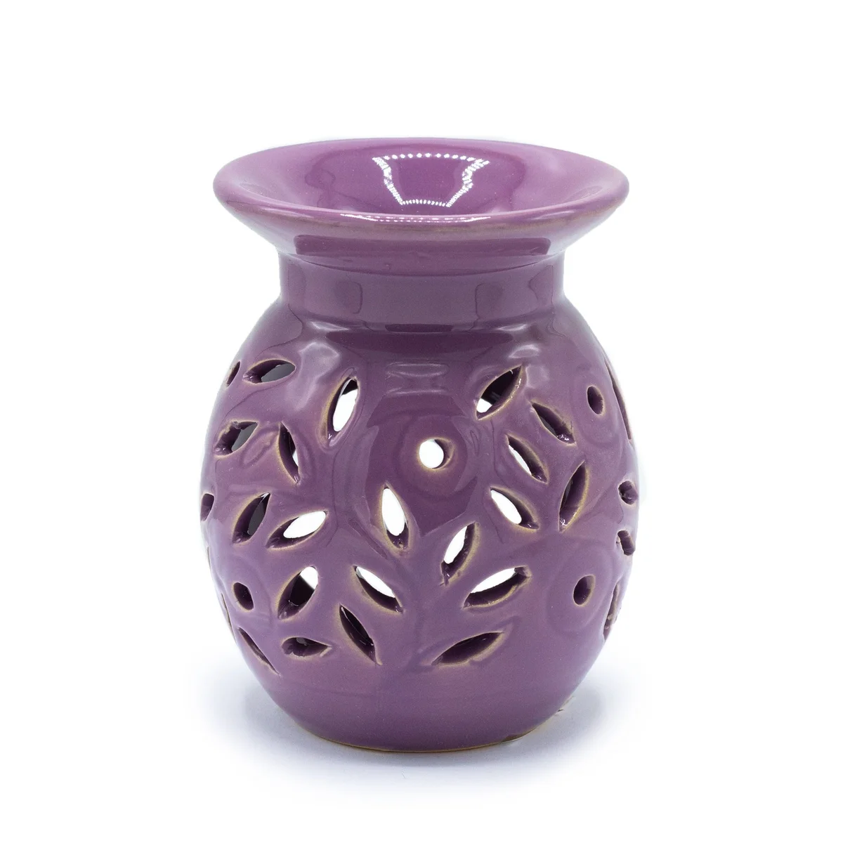 Lavender oil burner with floral ceramic base and glass chamber.