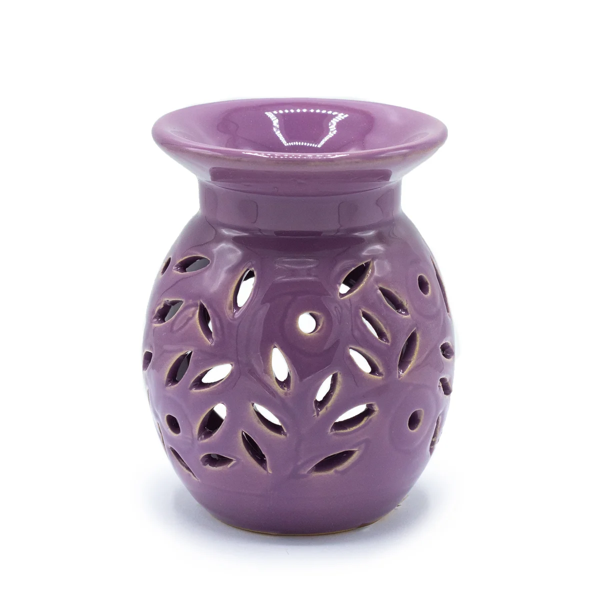 Floral oil burner in ceramic with fresh lavender sprigs, supporting a small bowl for essential oils.