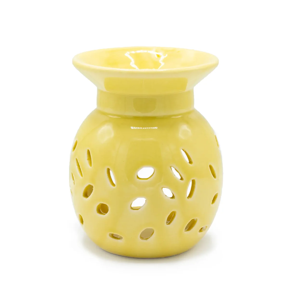 Yellow floral oil burner with decorative flower motifs on a ceramic base.