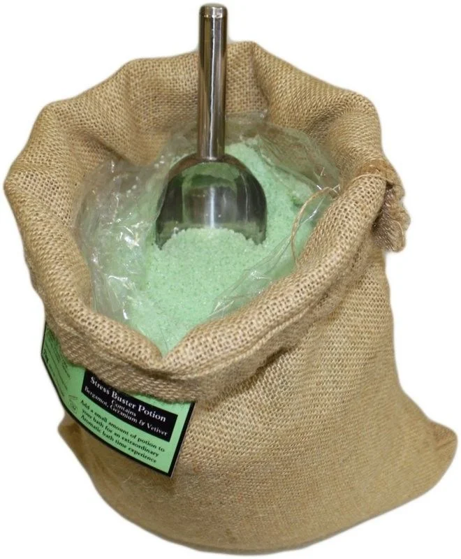 7kg hessian sack labeled Stress Buster Potion, weighing 7kg, dark brown burlap cloth.