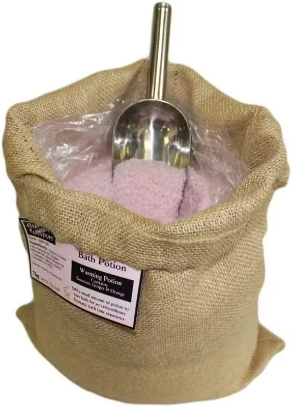 Warming potion bag in a Hessian sack, labelled 7kg, tied with a wooden cord