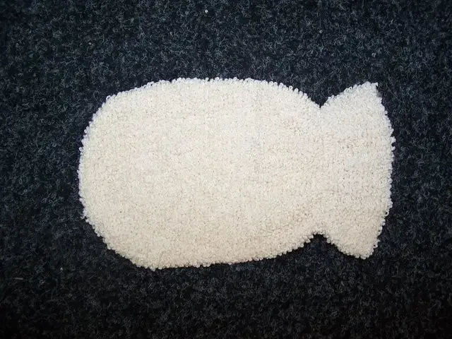 Bamboo washing mitt with textured bamboo fabric and ergonomic handle, shown flat on neutral background.