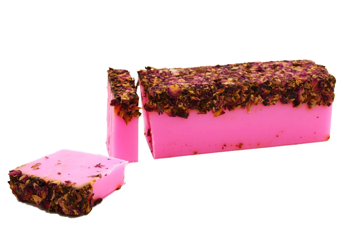 Rose soap loaf scented with rose petals, creamy white bar.
