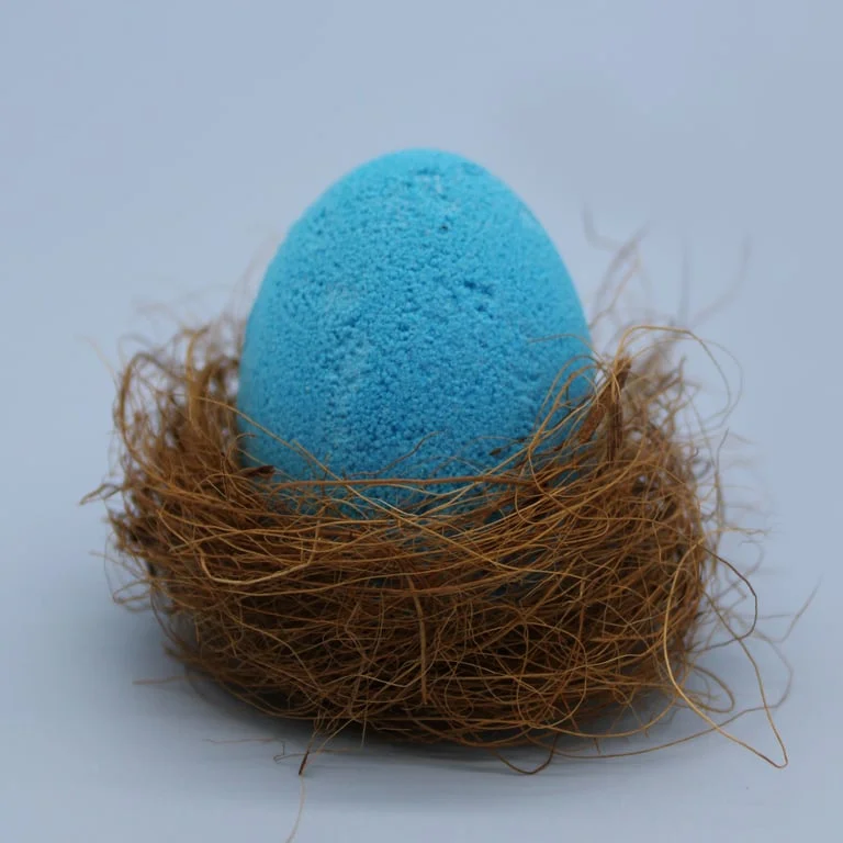 Tray of scented bath eggs in blueberry scent.