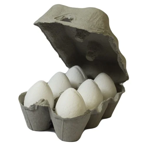 Coconut scented bath eggs displayed in a bath egg tray