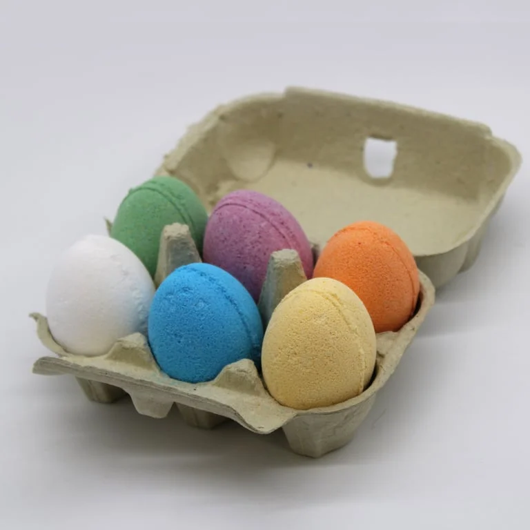 Tray of coconut bath eggs arranged together on a tray.