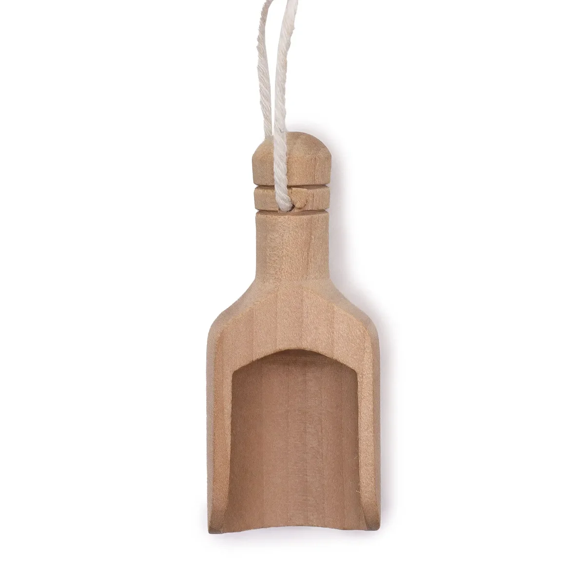 Small wooden scoops arranged neatly on a rustic background, natural wood texture visible.