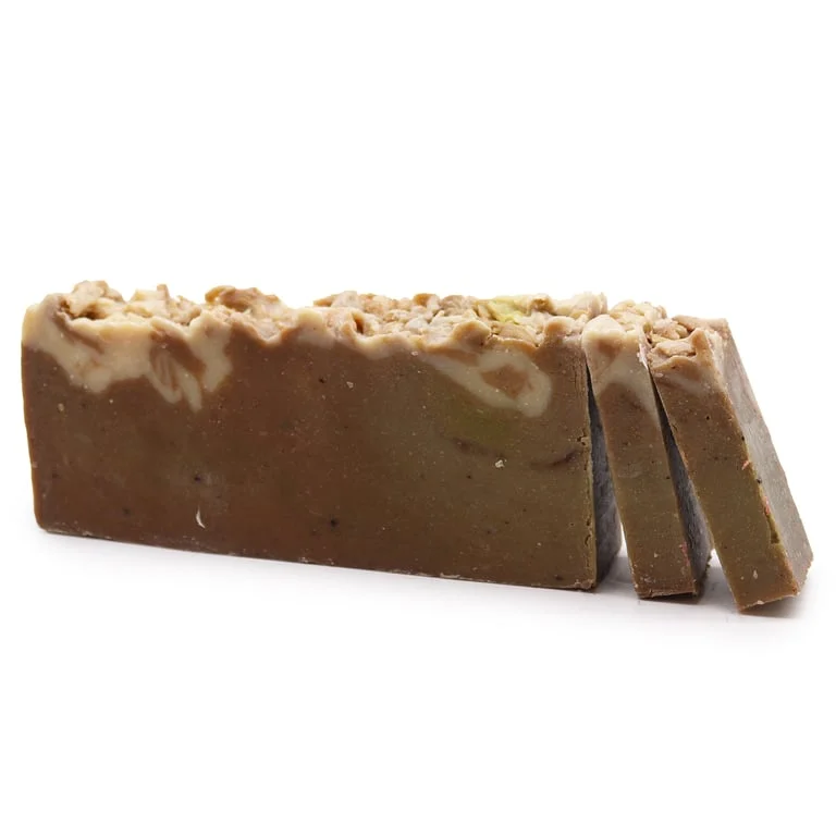 Chocolate olive oil soap loaf with a smooth dark brown surface, showing a neat block shape.