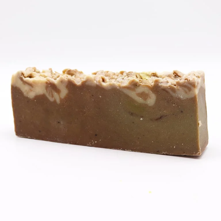Chocolate coloured olive oil soap loaf.