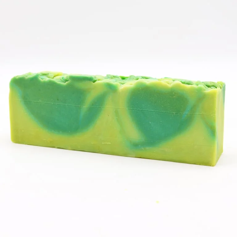 Loaf of olive oil soap featuring aloe vera label.