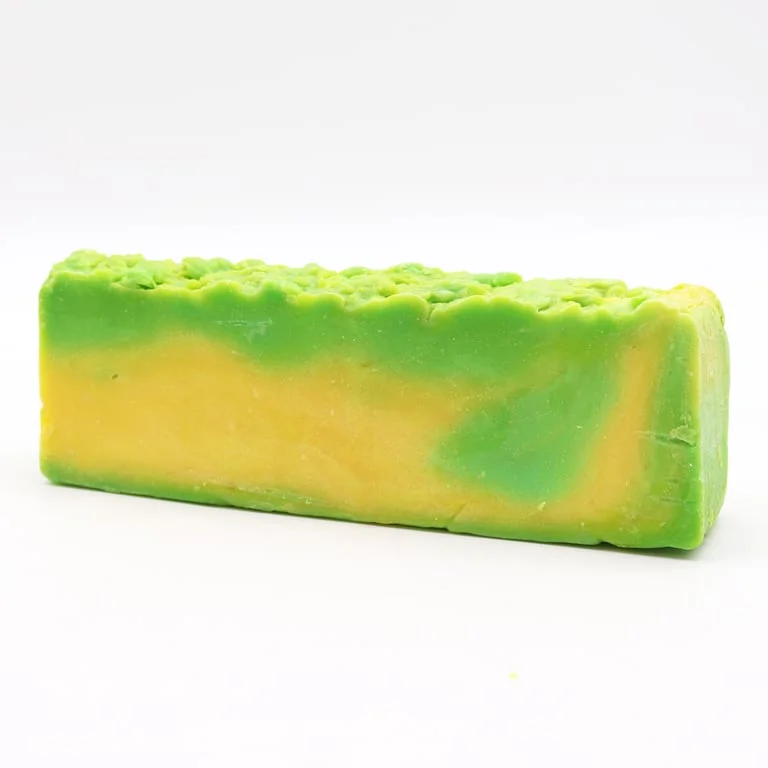 Loaf of jojoba soap infused with olive oil, natural soap appearance and subtle scent.