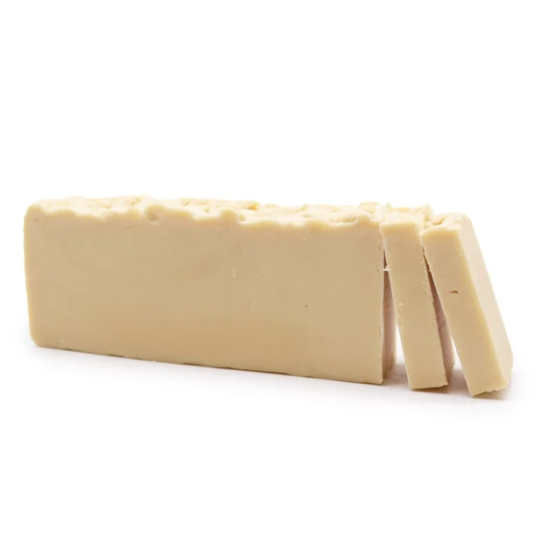 Donkey milk soap loaf made with olive oil, hand‑crafted soap in a beige package.
