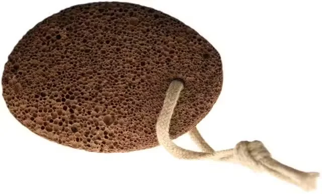 Oval volcanic natural foot stone with smooth surface displayed against neutral background