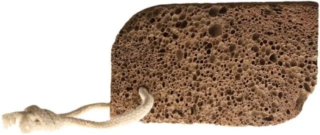 Volcanic foot stone in lemon shape, rugged stone surface with uneven edges