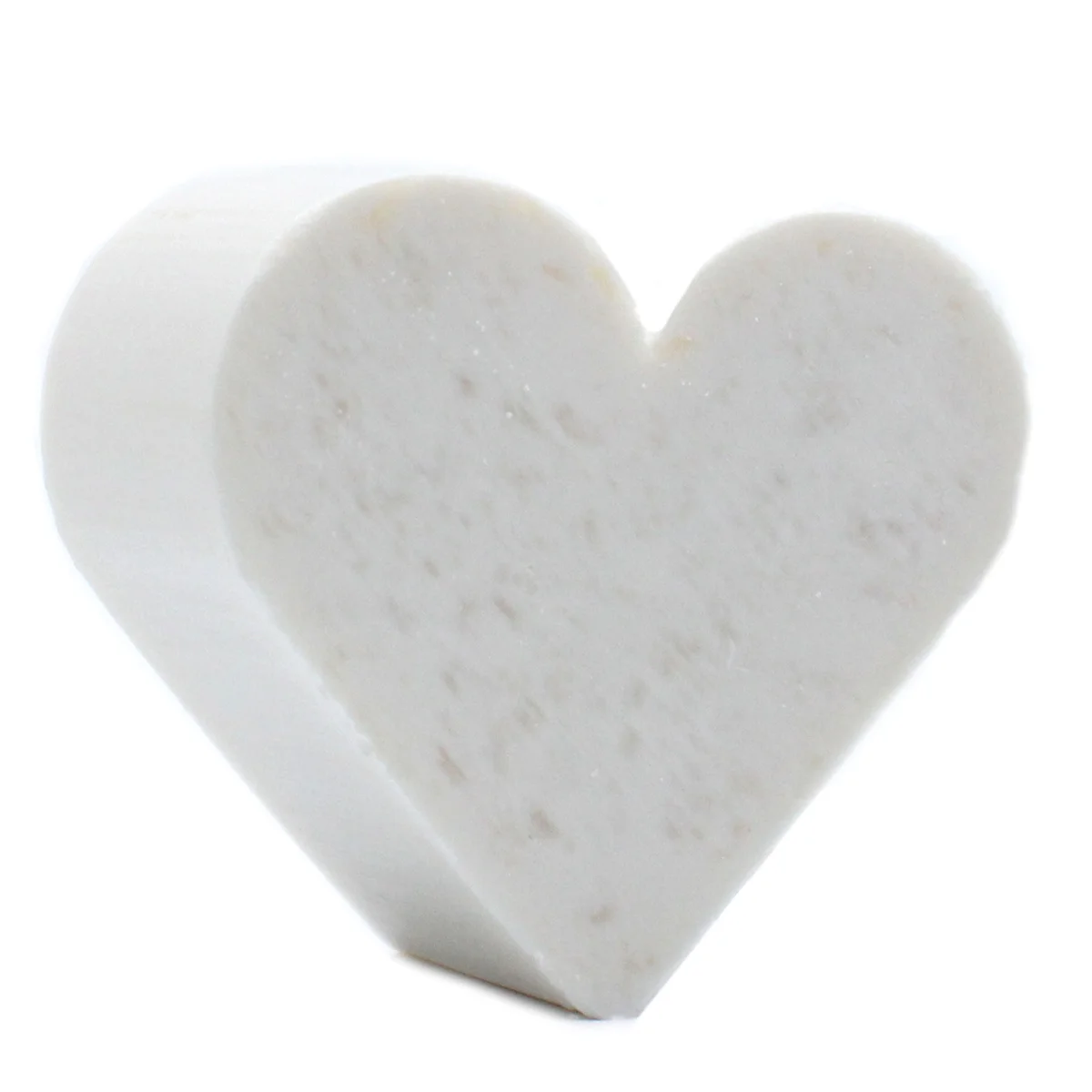 Heart guest soap bar shaped like a heart, coconut fragrance, green background with subtle leaf accents.